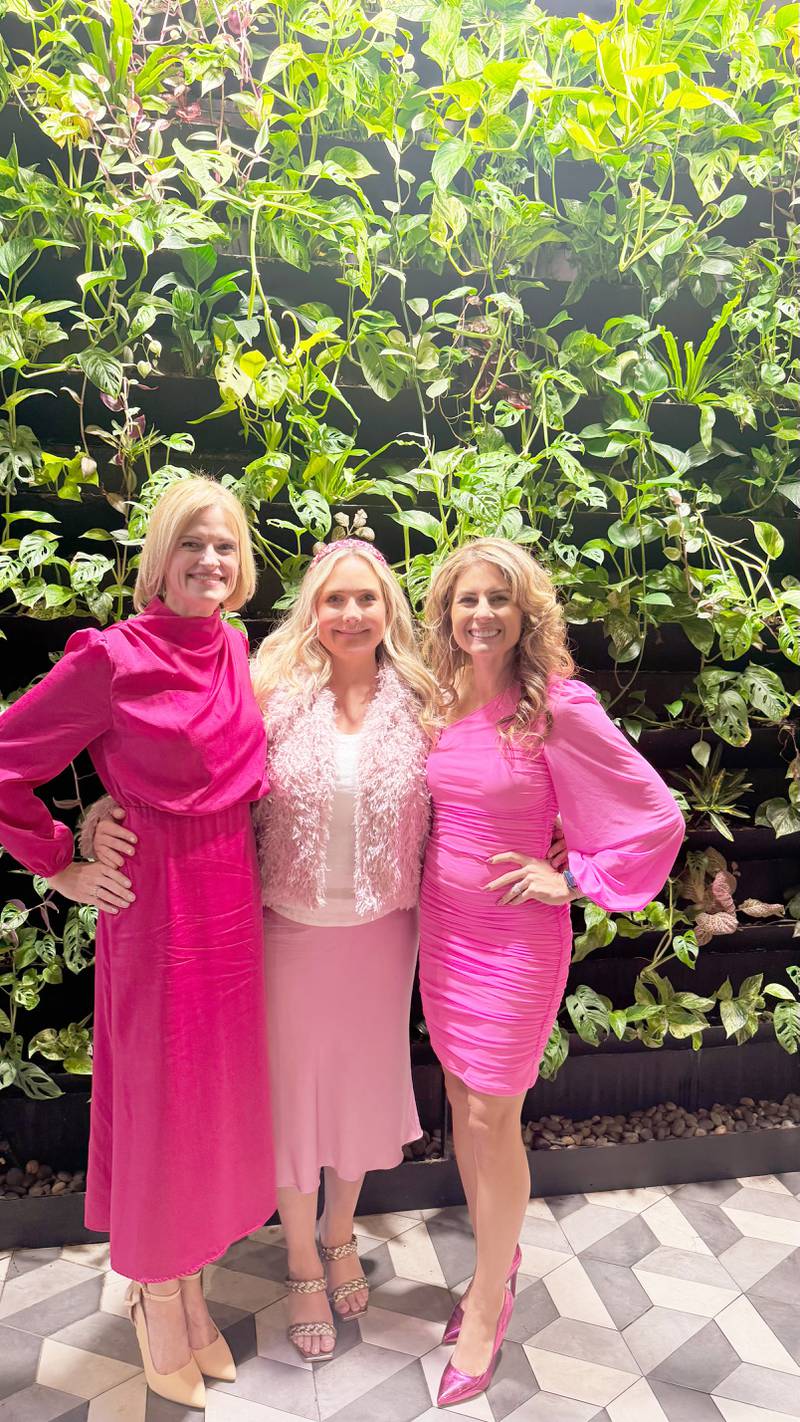 Heather Huffman (left) and Genesis Hey Krick (right) are pictured with Leigh Clark, author of the Slaying the USA book series. Huffman and Krick are featured in the latest book, "Slay Chicago."