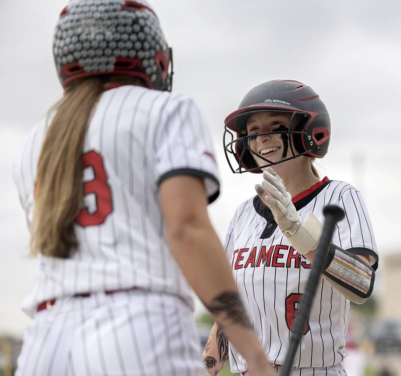 Fulton’s Brooklyn Vogel celebrates after coming in to score against Morrison Friday, May 22, 2026, at the Class 1A softball regional at Newman High School.
