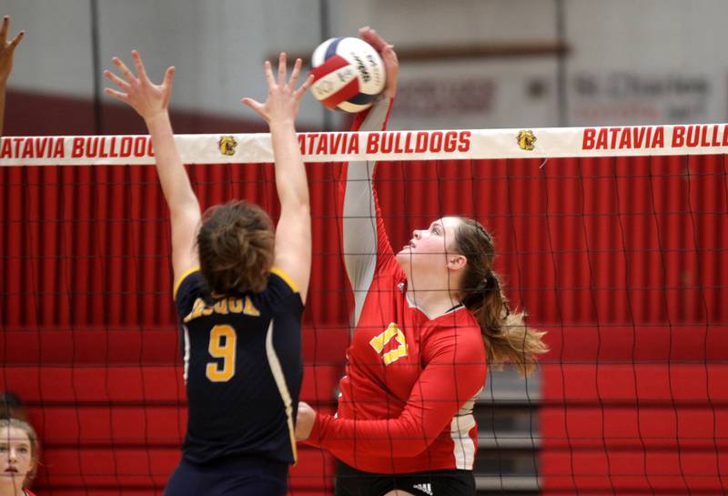 Batavia’s Brooke Robertston gets the ball over the net past Neuqua Valley’s Lara Clifford during a game at Batavia on Tuesday, Aug. 29, 2023.