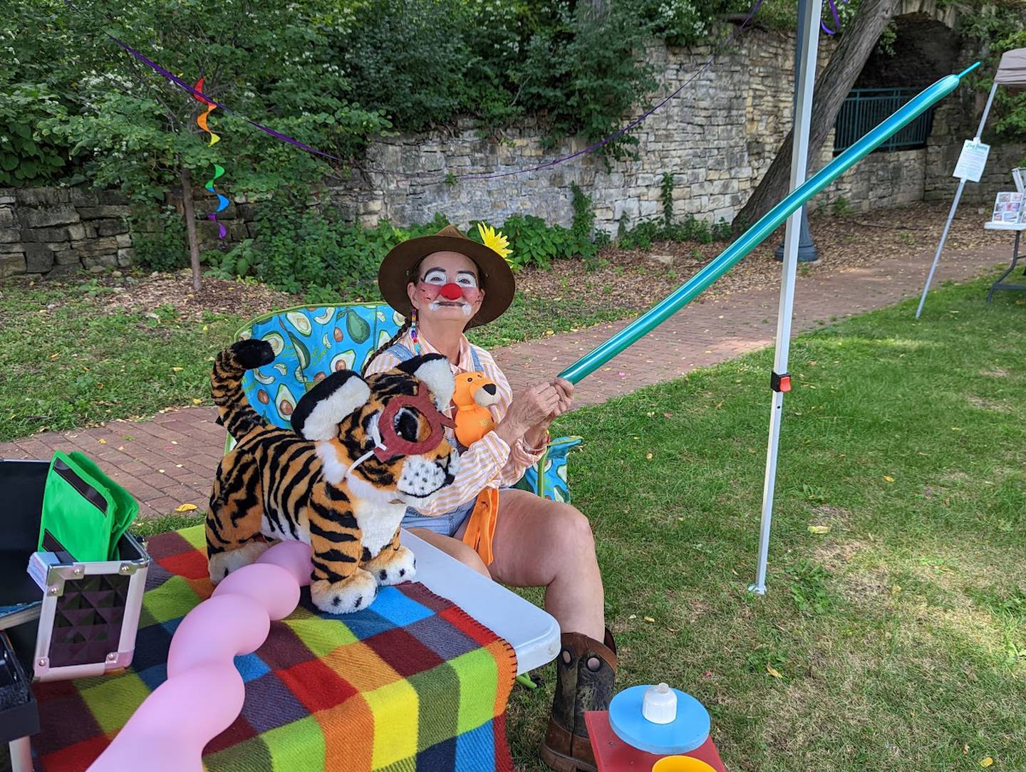 Debra Jackson, also known as Catfish the Clown, of Morris, entertained children at the third Joliet PrideFest. The Joliet Pride Network held the event on Saturday, Sept. 17, 2022, at the Billie Limacher Bicentennial Park and Theatre in Joliet. The family friendly event included an all-age drag show, live music, food, and activities for children and teens.