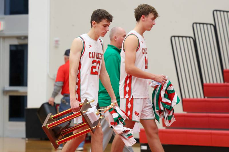 Nick Olivero of L-P walks with 2nd place trophy on Saturday, December 14, 2024 at Hall High School in Spring Valley.
