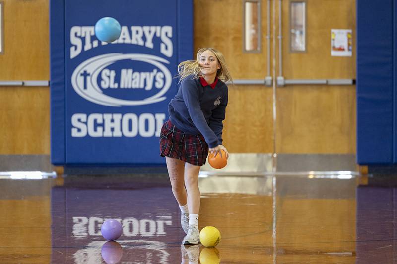 Dixon St. Marys seventh grader Blake Foster chucks a dodgeball Monday,  Jan. 26, 2026 during the Deanery Dodgeball tournament.