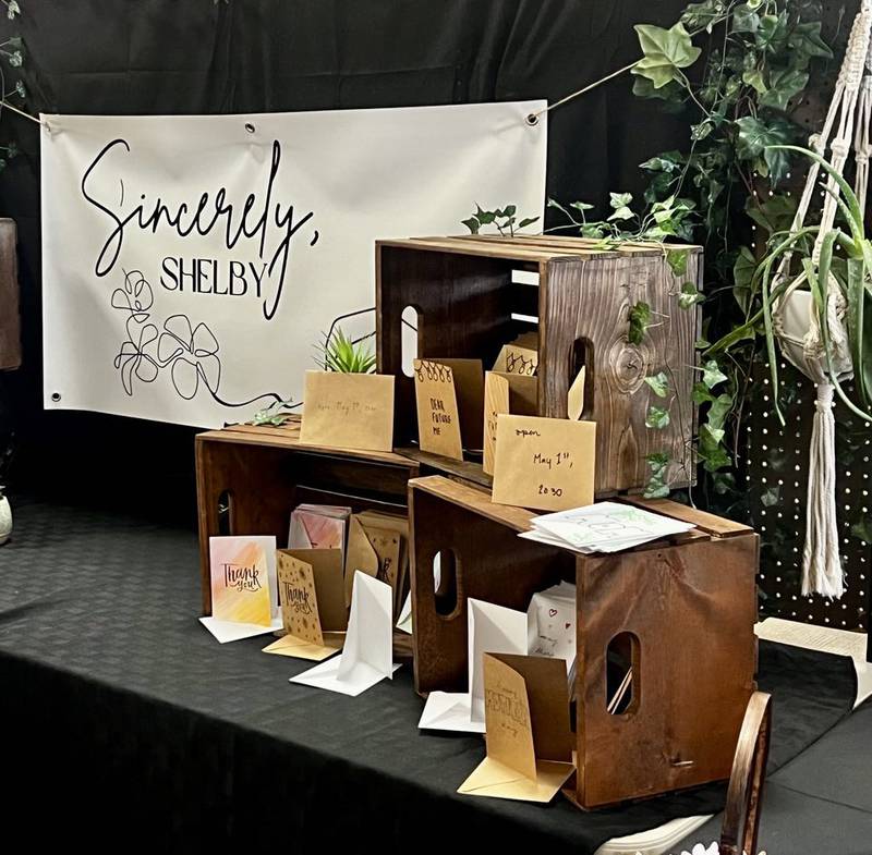 Handmade greeting cards from a student-owned business, Sincerely, Shelby, are displayed at the Whiteside Area Career Center's CEO program student trade show in Sterling's Northland Mall on April 23, 2025.