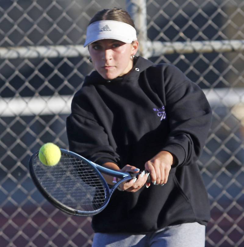 Wauconda's Reagan Mohr returns the ball Thursday, Oct. 23, 2025, during the first day of the IHSA State Girls Tennis Tournament at Schaumburg High School.