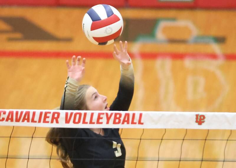 Sycamore's Elizabeth Goff sets the ball during the Class 3A Sectional semifinal game on Tuesday, Nov. 4, 2025 in Sellett Gymnasium at L-P High School.