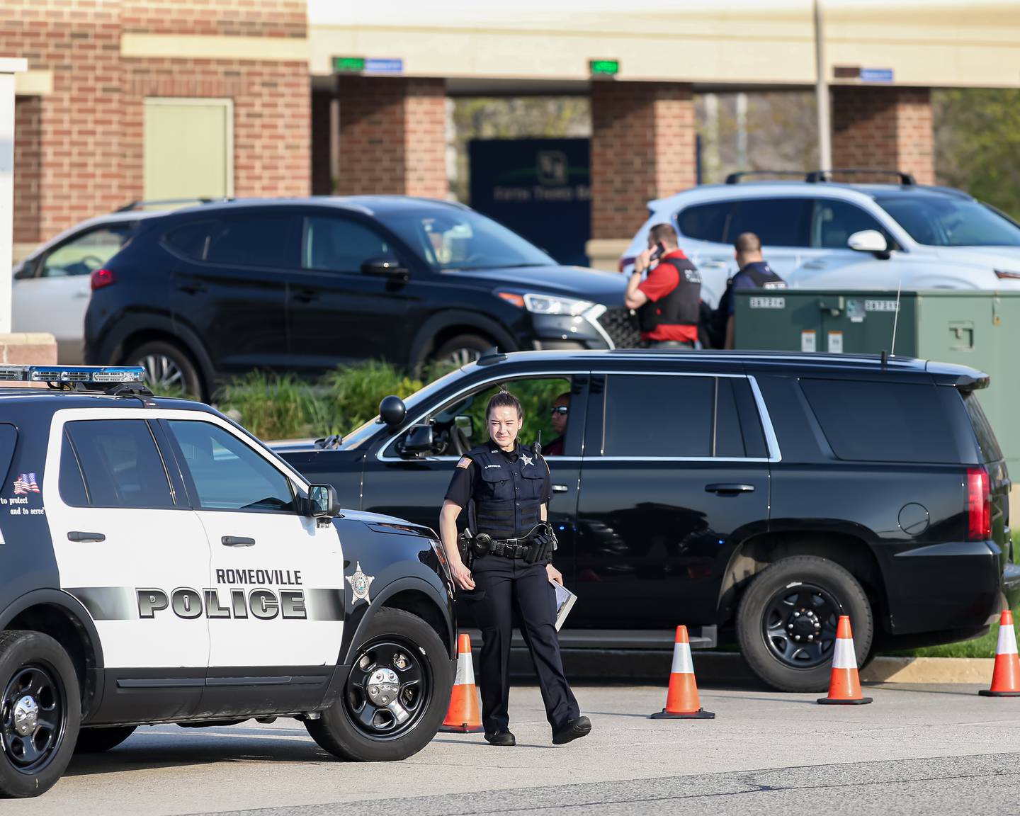 Officers at the scene of a hostage situation on May 10, 2022 at Fifth Third Bank in Romeoville.