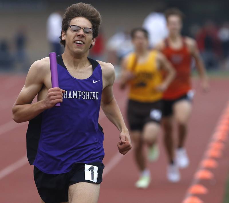 Hampshire’s Mitchell Dalby races to the finish line as he runs the last leg of the 4 x 800 meter relay during the IHSA Class 3A Huntley Boys Track and Field Sectional Wednesday, May 18, 2022, at Huntley High School.