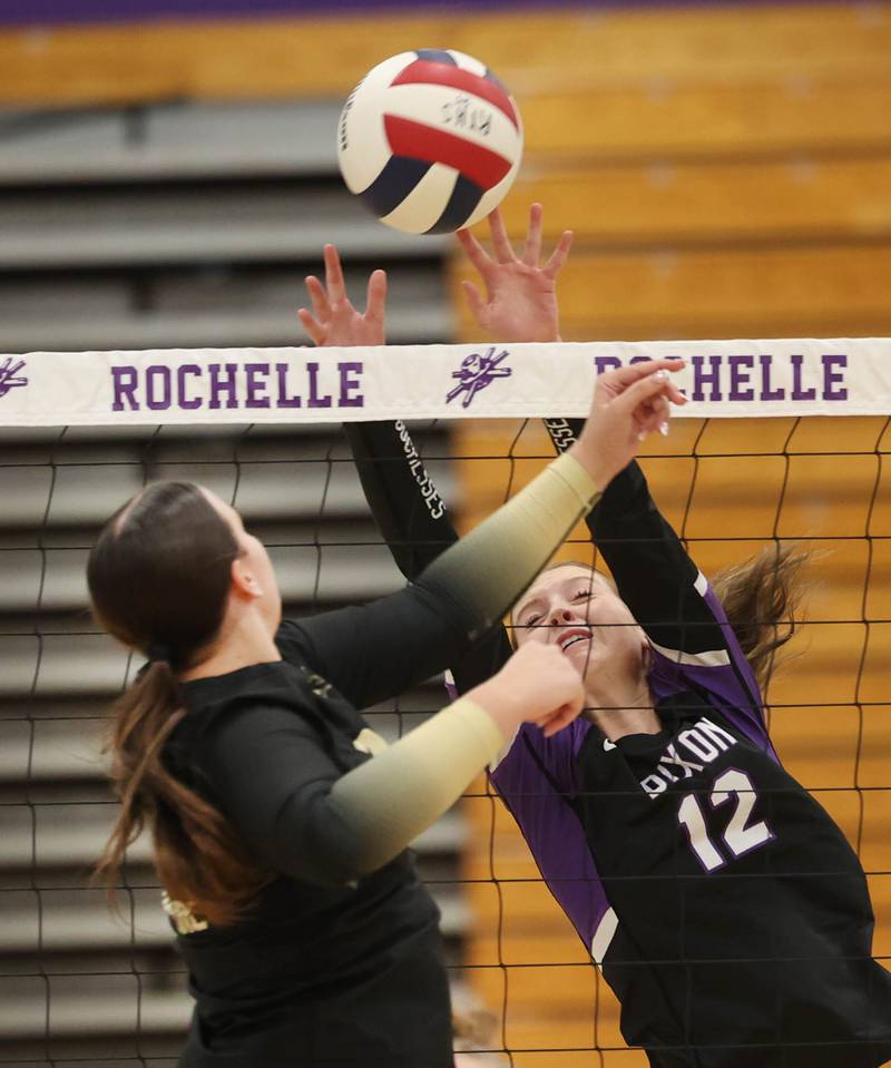 Dixon’s Izzy Queckboerner goes up against Sycamore's Sophia Lichthardt Thursday, Oct. 30, 2025, during their Class 3A regional championship match in Rochelle.