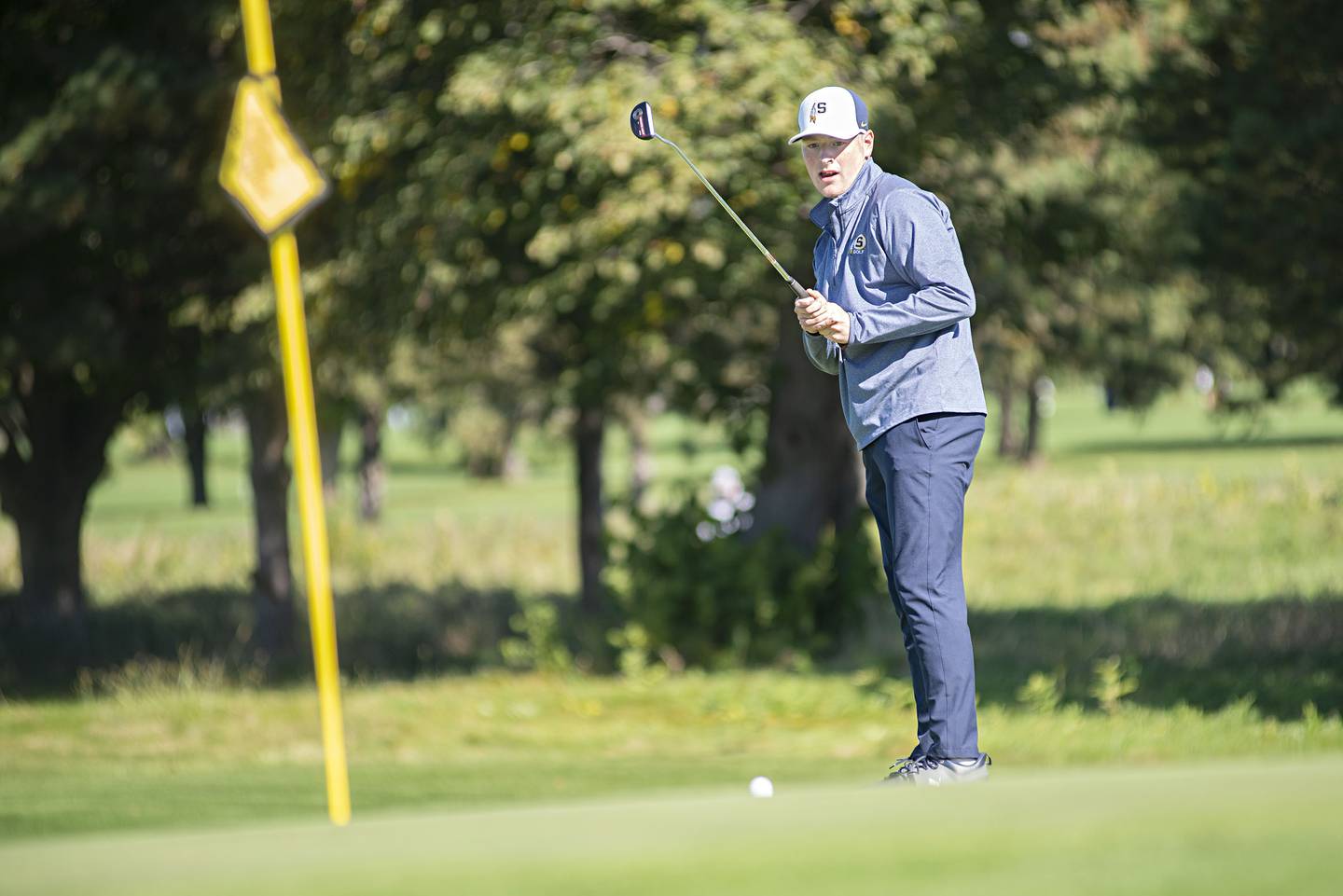 Sterling’s Cameron O’Brien putts on no.10 at Emerald Hill in Sterling for the Class AA IHSA sectional golf meet.