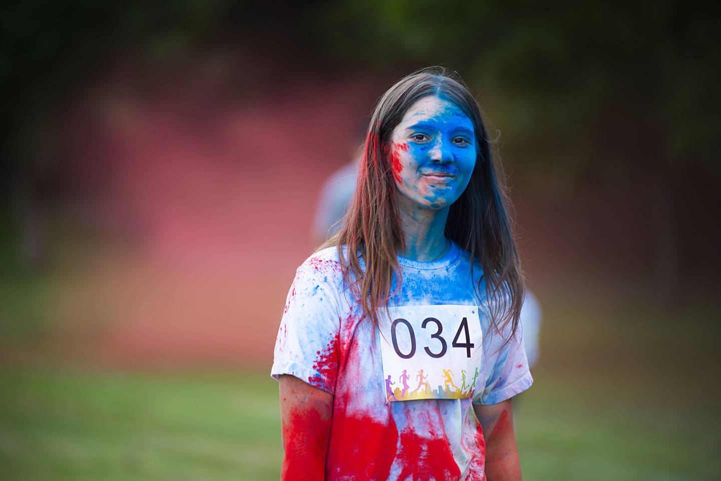 After having worked through all the color stations, Bella Henson of Prophetstown makes her way to the finish line.