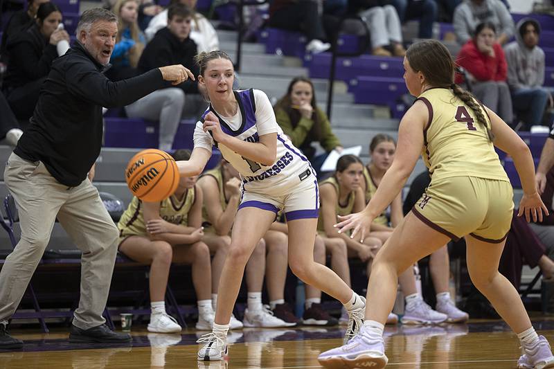 Dixon's Addy Lohse makes a pass against Morris’ Brooke Thorson Friday, Jan. 3, 2025, at Dixon High School.