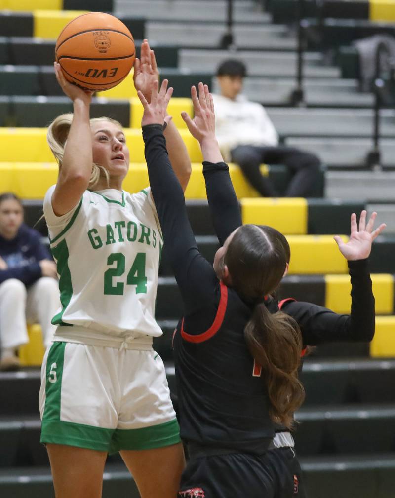 Crystal Lake South's Gracey LePage shoots the ball over Huntley's Lana Hobday during a Fox Valley Conference girls basketball game on Friday, Jan. 30, 2026, at Crystal Lake South High School.