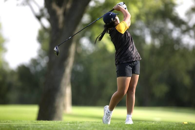 Glenbard North’s Angel Nguyen tees off during the Class 2A Glenbard North Regional girls golf meet at Bloomingdale Golf Club on Thursday, Sept. 28, 2023.