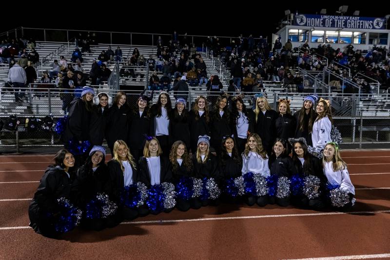 Lincoln-Way East’s dance team takes a photo prior to a varsity football round one playoff game against Stevenson at Lincoln-Way East on Oct. 31, 2025.