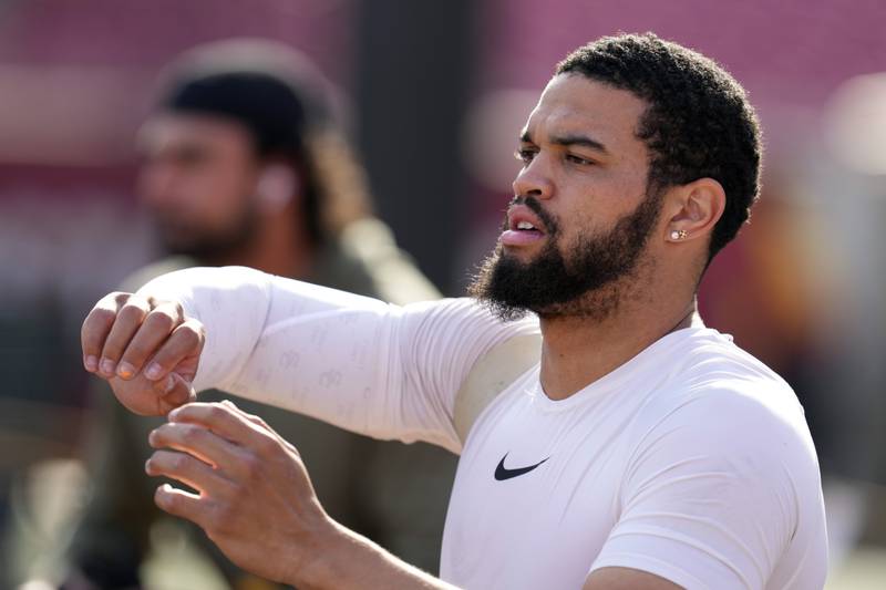 Southern California quarterback Caleb Williams (13) warms up before an NCAA college football game against Washington Saturday, Nov. 4, 2023, in Los Angeles. (AP Photo/Marcio Jose Sanchez)