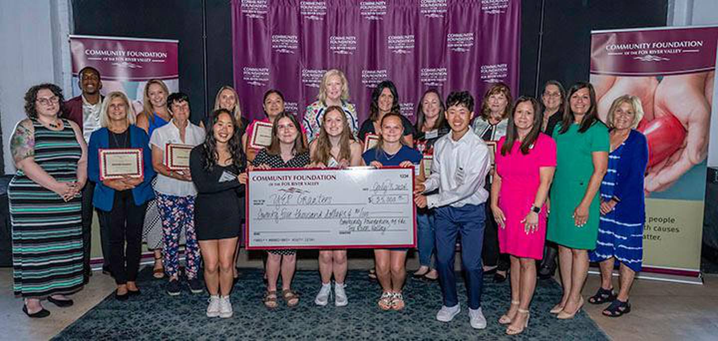 Representatives from nine Fox Valley nonprofits serving youth needs gathered on Thursday, July 11, at Society 57 in downtown Aurora to accept a total of $25,000 in grants from the Community Foundation's Engagement in Philanthropy program.