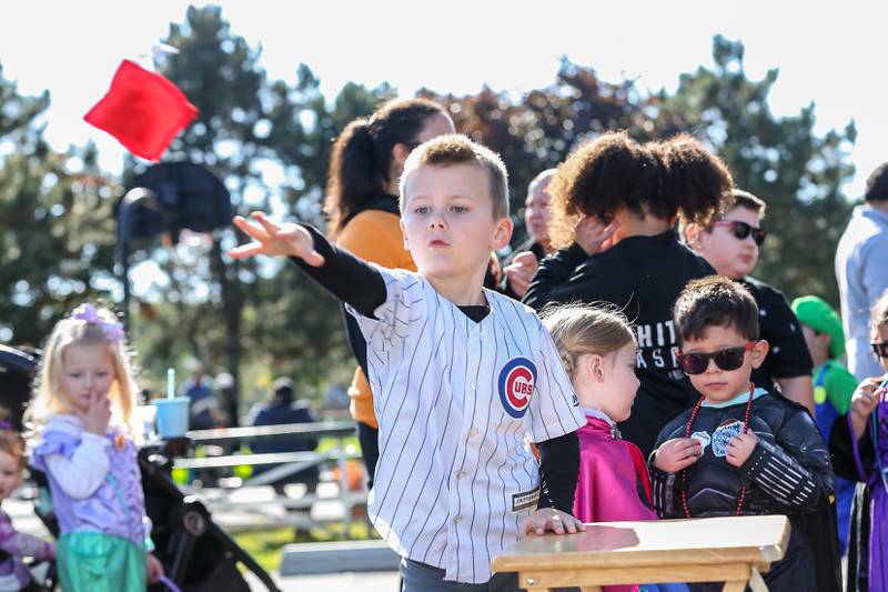 Lincoln Gill plays bags for candy at the La Grange Trunk or Treat event.  Oct 21, 2023