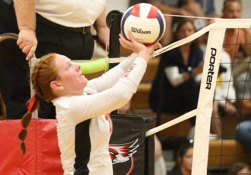 Henry-Senachwine's Brynna Anderson pushes the ball to the Putnam County side of the net on Thursday, Aug. 28, 2025 at Henry-Senachwine High School.