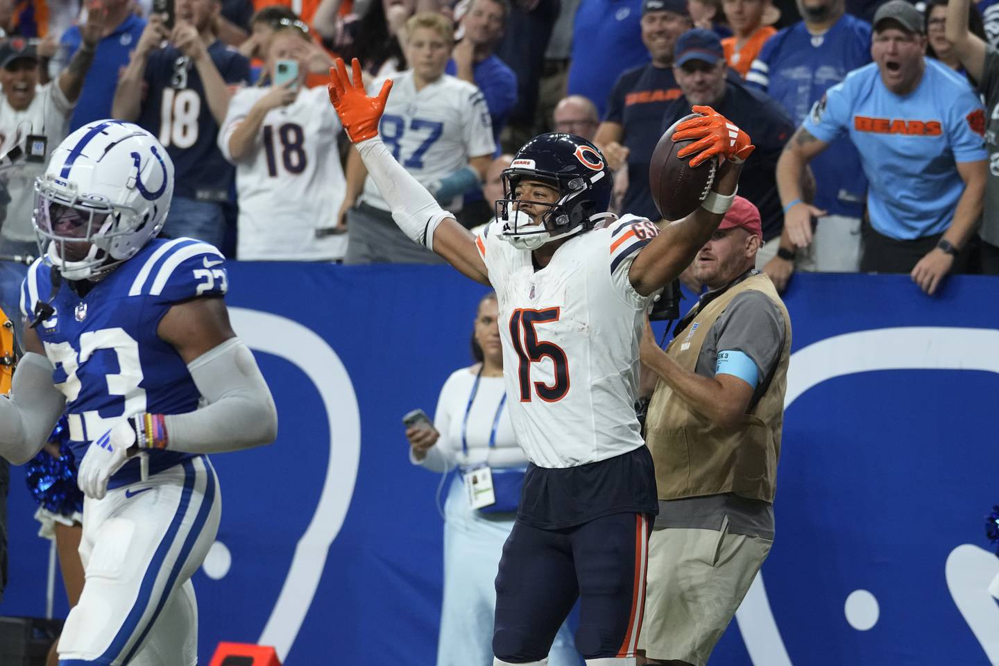Chicago Bears wide receiver Rome Odunze (15) celebres his touchdown catch during the second half of an NFL football game against the Indianapolis Colts Sunday, Sept. 22, 2024, in Indianapolis. (AP Photo/Michael Conroy)