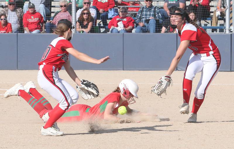 L-P's Maggie Boudreau steals second base as the ball gets by Streator's Kieran Black and teammate Mya Zavada during the Class 3A Regional semifinal game on Tuesday, May 27, 2025 at Pontiac High School.