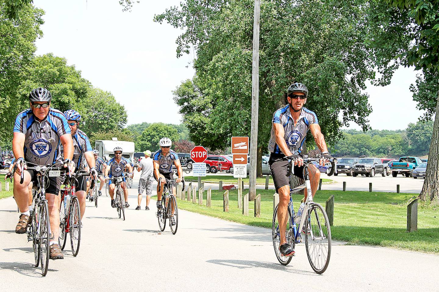 Joliet Police Officer John Stefanski (left) was among 54 cyclists that rode across Illinois in the Cycle Across America police memorial ride honoring fallen law enforcement officers. The ride was founded, in part, because of the loss of Joliet officer Jonathan Walsh 10 years ago.