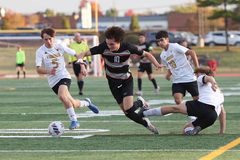 Lincoln-Way Central’s Connor Pate draws the penalty to set up a penalty kick against Joliet West in the Class 3A Lincoln-Way Central Regional semifinal on Tuesday, Oct. 22, 2024 in New Lenox.
