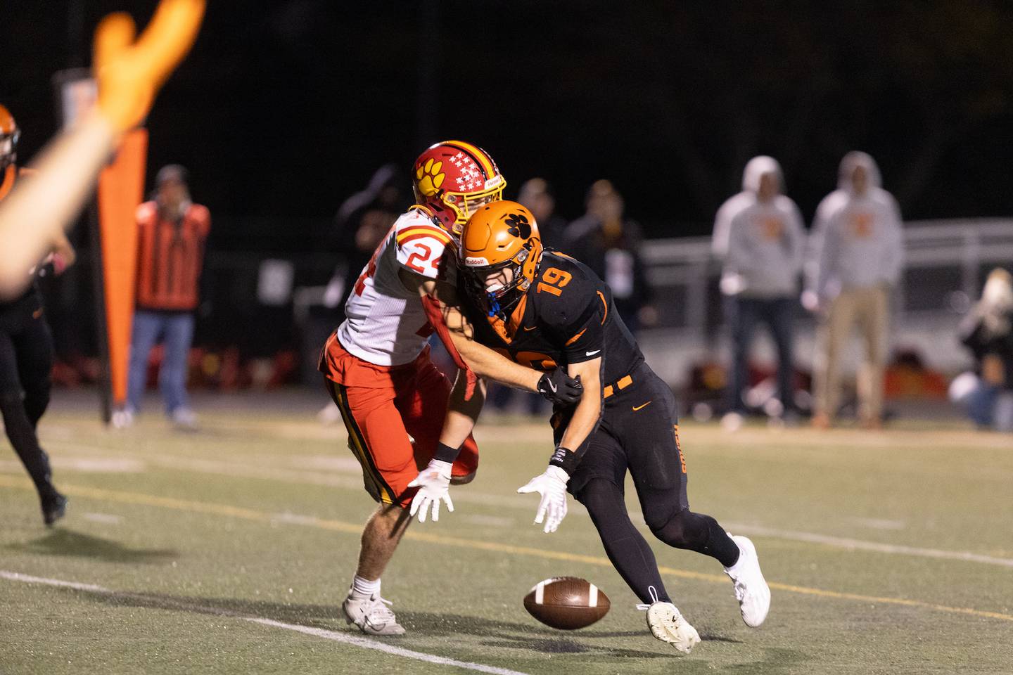 Batavia's Luke Gardner breaks up the pass to Wheaton Warrenville South's Brody Keith on Friday, Oct. 24,2025 in Wheaton.