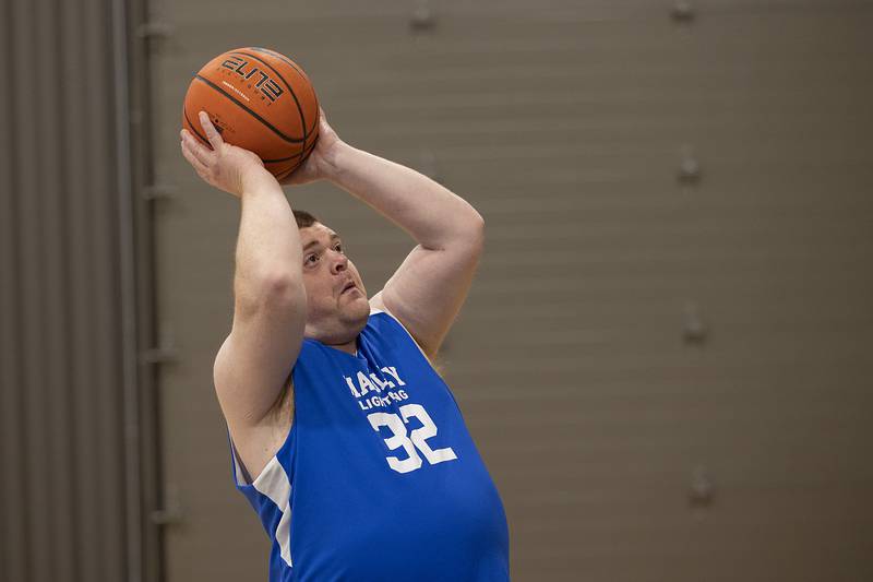 Joe works on his shooting skills during basketball practice Wednesday, Dec. 18, 2024, for his Mabley Center team.
