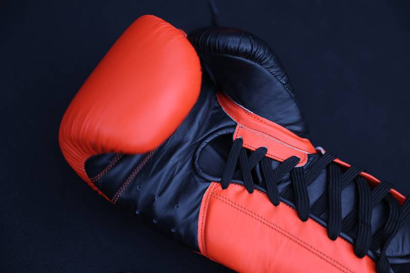A boxing glove lays in the ring at the ribbon cutting ceremony for Spartan Boxing on Wednesday, Nov. 8, 2023 in Lockport.