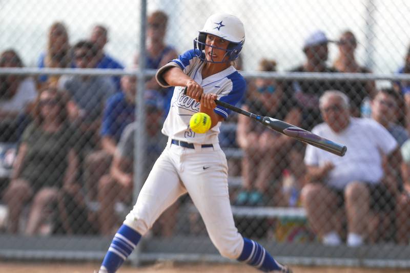 St. Charles North batter Leigh VandeHei makes contact on Monday, June 14, 2021, at Carl Sandberg High School in Orland Park, Ill. The Knights defeated the Stars 5-4.