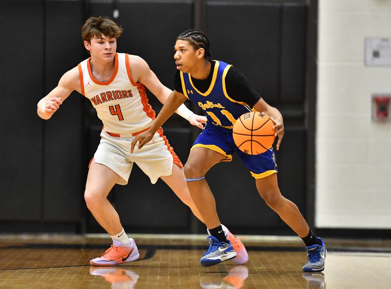 Joliet Central's Ezekiel Boatright (11) in action during the 4A Lockport Regional game against Lincoln-Way West' on Monday, FEB. 23, 2026, at New Lenox.