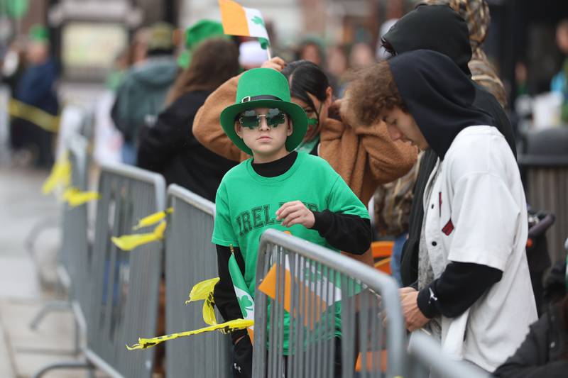 Mac McMahon, 12, looks for the start of the annual Plainfield Hometown Irish Parade on Sunday, March 15, 2026 in Plainfield.