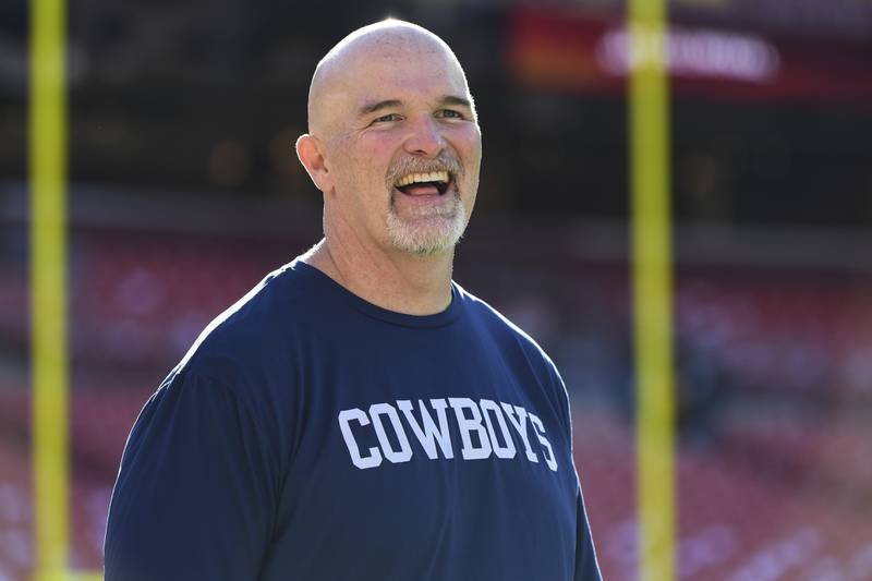 Dallas Cowboys defensive coordinator Dan Quinn looks on during warmups before playing the Washington Football Team on Dec. 12 in Landover, Md.