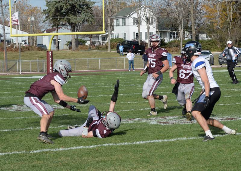 Rockridge's Landon Wheatley (4) deflects an Eastland-Pearl City pass into the hands of his teammate Liam Steele for an interception during 2A state football playoff action on Saturday, Nov. 2, 2024 at Eddington.