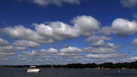 2 rescued after boat flips over on Crystal Lake