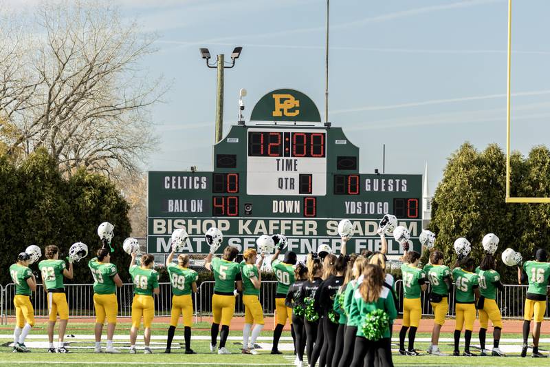 Providence’s players stand for the National Anthem prior to a 5A varsity football playoff game against Washington at Providence on Nov. 15, 2025.