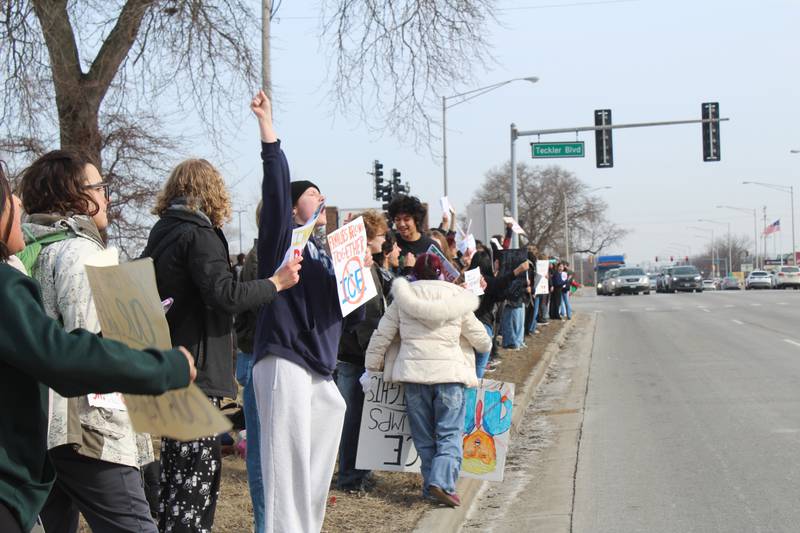 Crystal Lake Central Students line up along Route 14 to protest against the actions of Immigration and Customs Enforcement agents on Feb. 9, 2026.