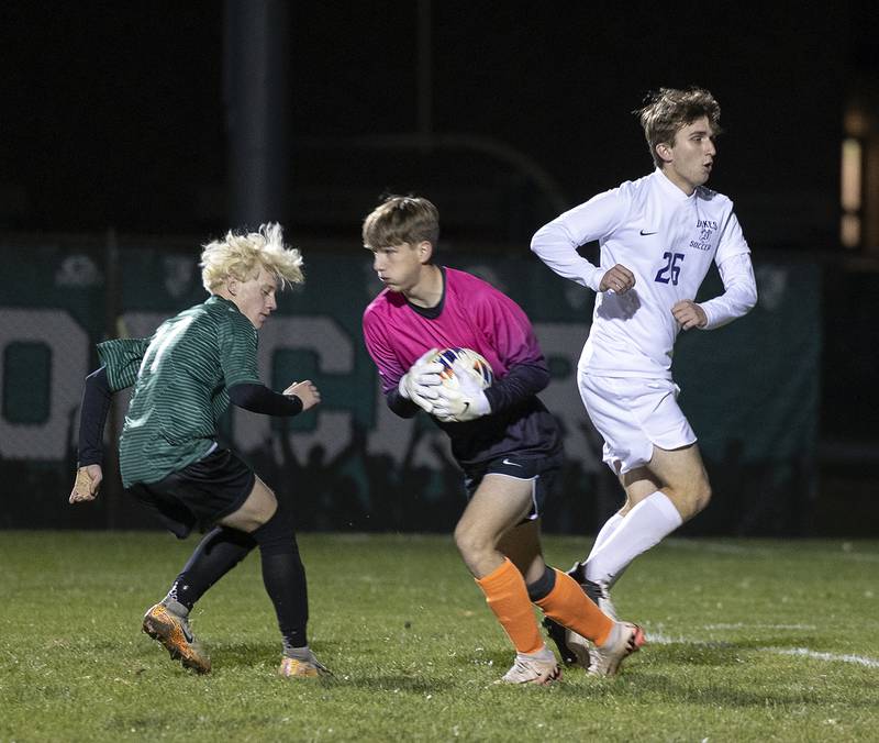 Dixon goalie Ethan Bond handles the ball against Geneseo Wednesday, Oct. 23, 2024, during the class 2A soccer regional in Geneseo.