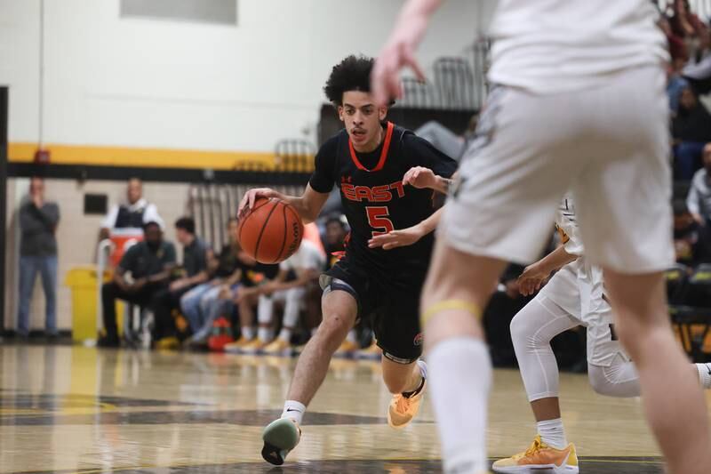 Plainfield East’s DeSean Millar makes a move against Joliet West on Friday, Dec. 8th, 2023 in Joliet.