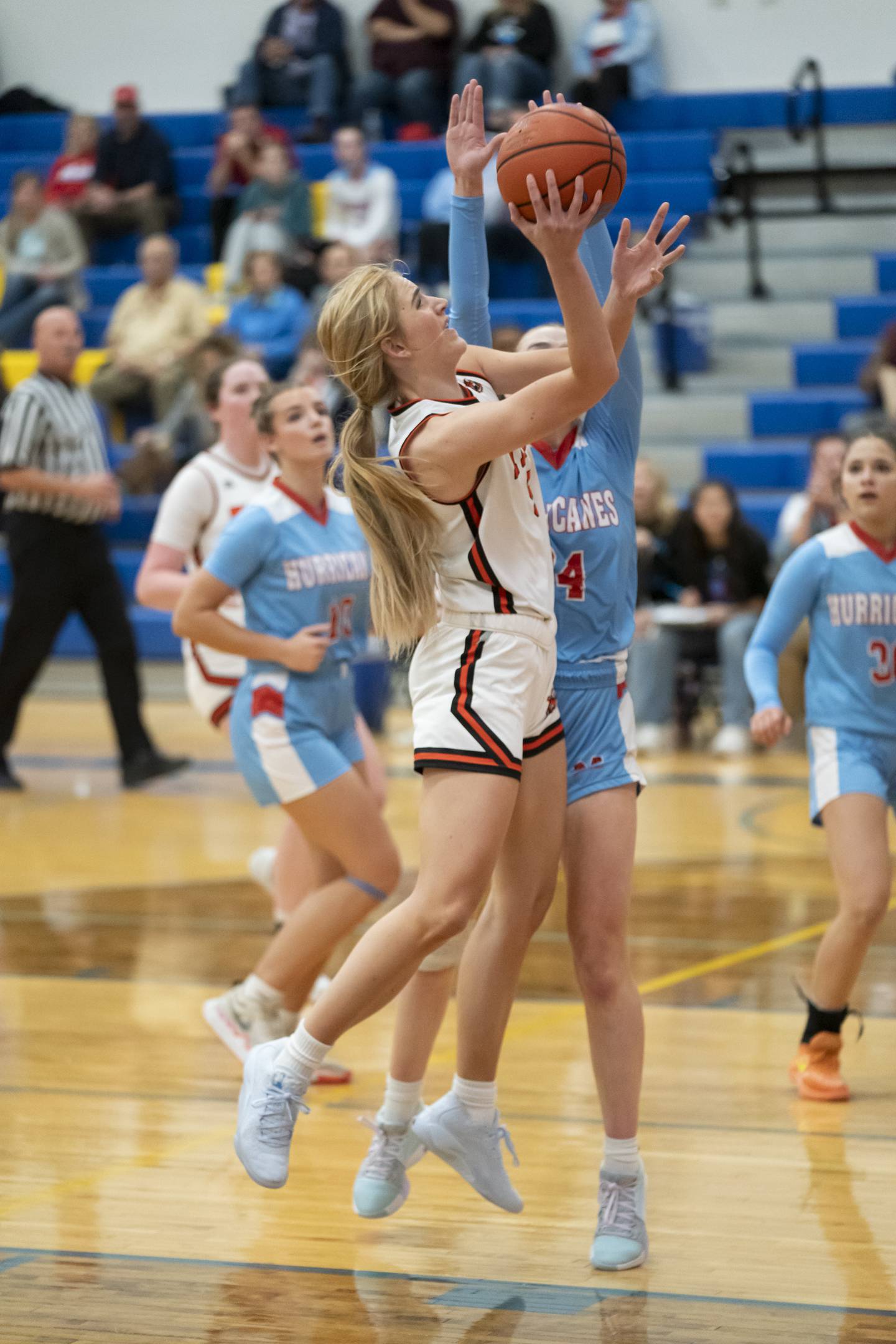 Crystal Lake Central's Ruby Macke shoots over Marian Central's Juliette Huff during their game at the Johnsburg High School Varisty Feast Mode Holiday Girls Basketball Tournament on Tuesday, November 19, 2024 in Johnsburg. Ryan Rayburn for Shaw Local