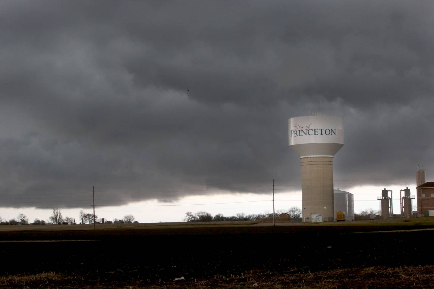 A rotating wall cloud appears over the Princeton water tower Route 26 north of Princeton on Friday, May 31, 2023.