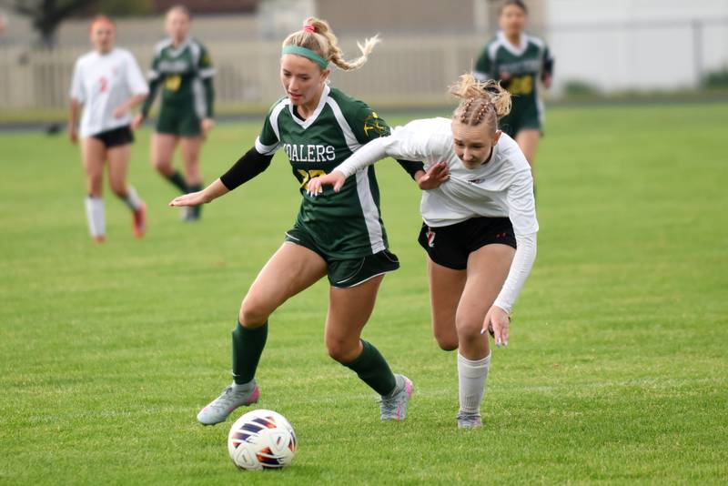 Coal City's Nettie O'Connor, left, and Beecher's Saiorse Loonam battle for positioning on their way to the ball during the Class 1A Manteno Regional championship Tuesday, May 20, 2025.