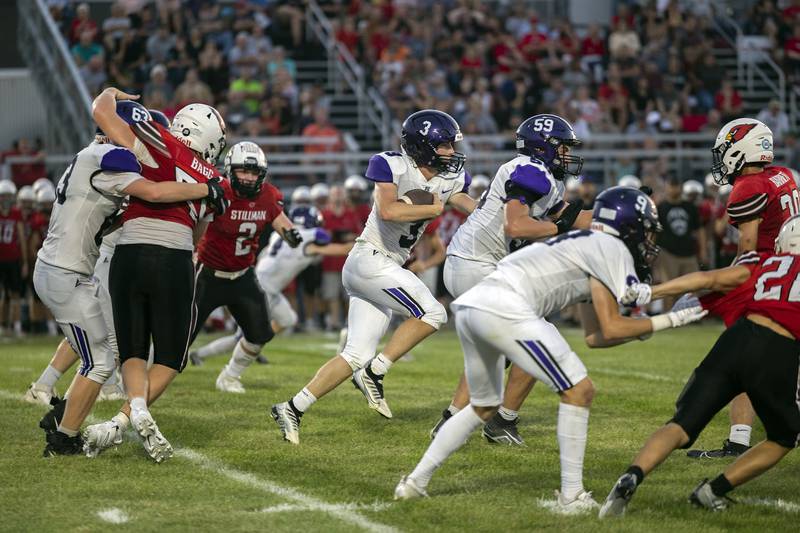 Dixon’s Tyler Shaner (3) finds room up the middle against Stillman Valley Friday, August 25, 2023.
