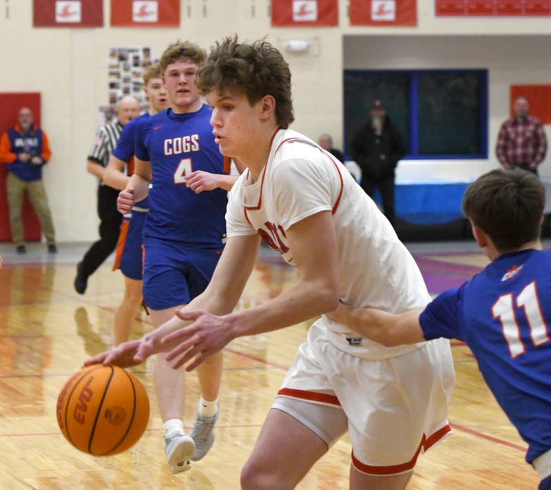 Oregon's Tucker O'Brien drives to the basket against Genoa-Kingston on Friday, Jan. 30, 2026 at the Blackhawk Center..