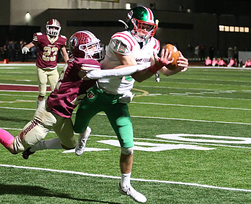 L-P's Brendan Boudrewu (15) misses this pass as Morris's A.J. Zweeres (23) defends during the Class 5A round one football game on Friday, Oct. 28, 2022 in Morris.