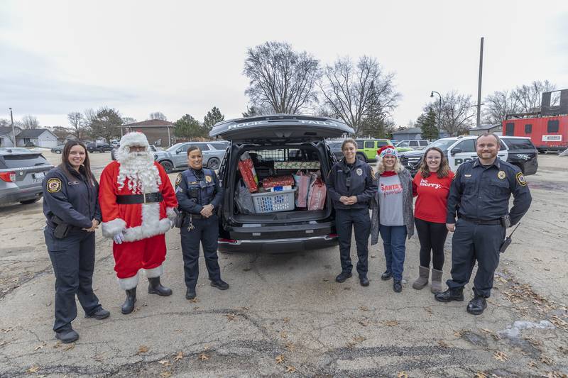 Operation Santa is ready to roll out Monday, Dec. 22, 2025, as members of the RFPD load up gifts, food and household items for delivery. Pictured: Autumn Day (left), Santa aka Jon Colberg, Betony Gluff, Abigail Peyton, Joy Colberg, Jessica Wind and Ryan McKanna.