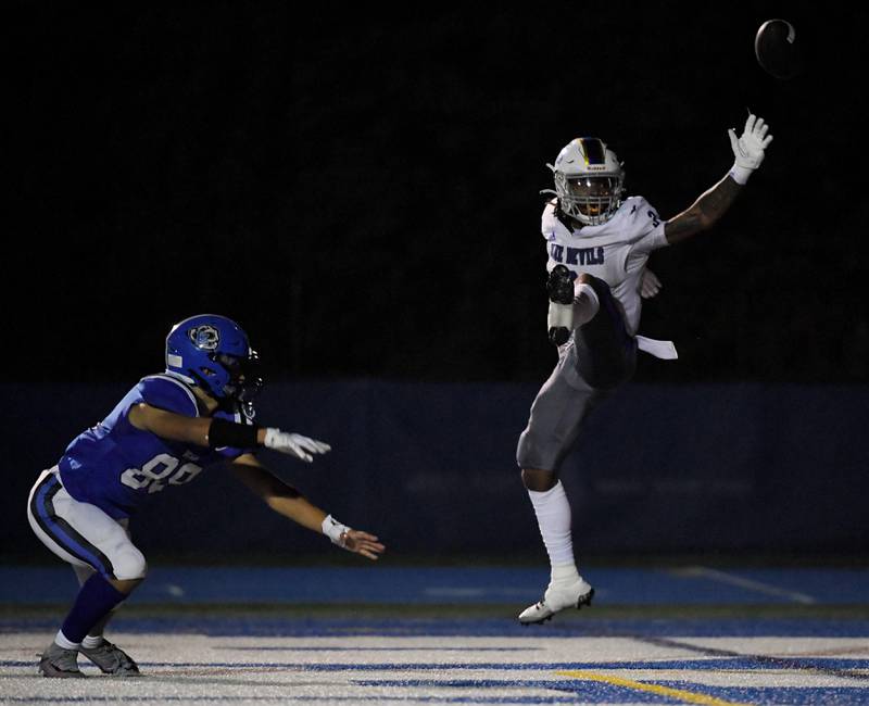 Warren’s Dajhir Gordon can’t catch a pass in the end zone asLake Zurich’s Christopher Chang defends  in a football game in Lake Zurich on Friday, September 22, 2023.