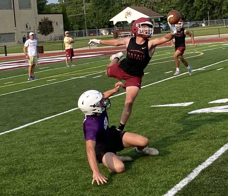 Morris defensive back A.J. Zweeres knocks down a pass Tuesday in a 7-on-7 competition againt Wilmington.