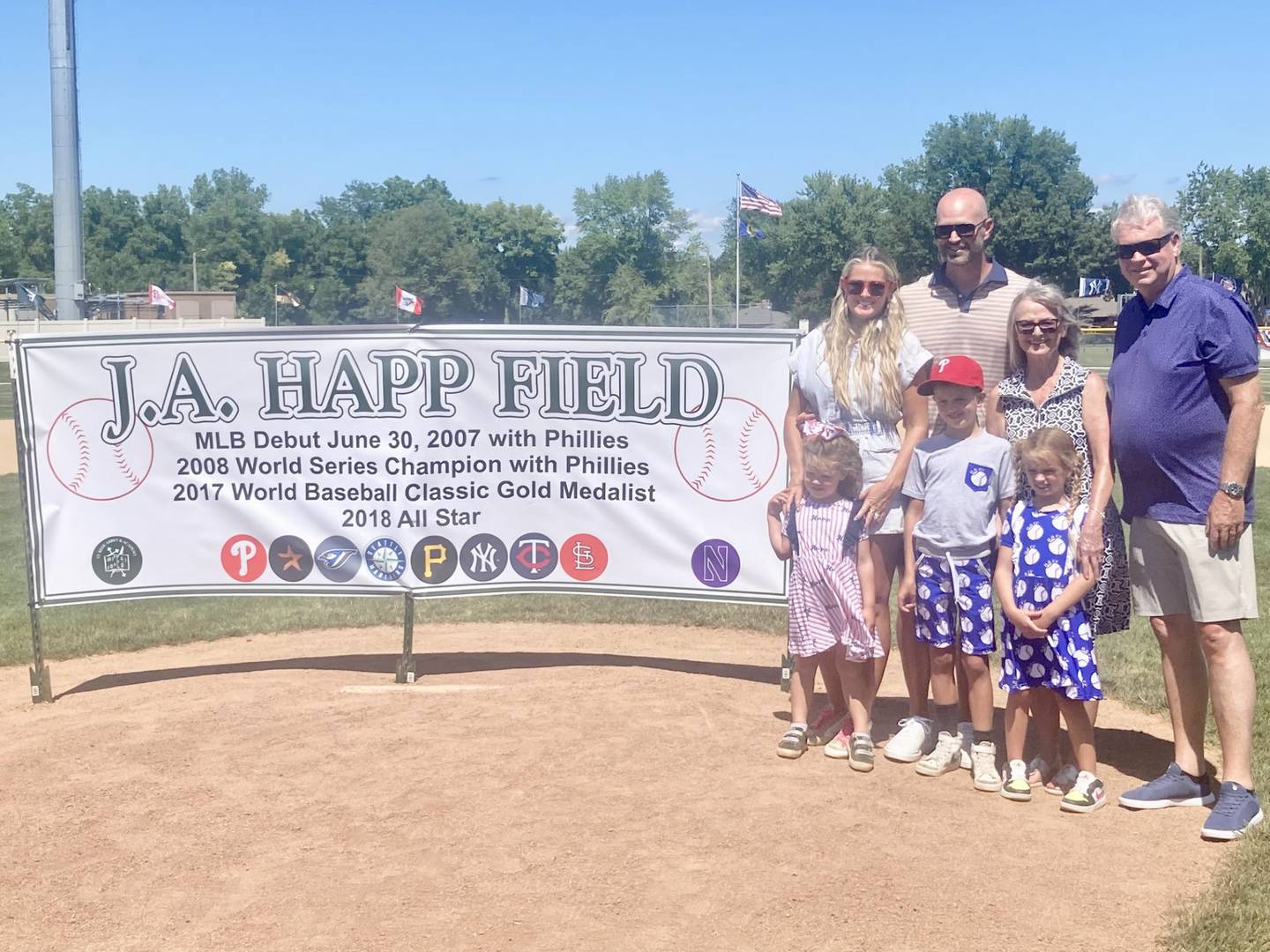 J.A. Happ is joined by his family for the renaming of the field after him Sunday at Washington Park in Peru.