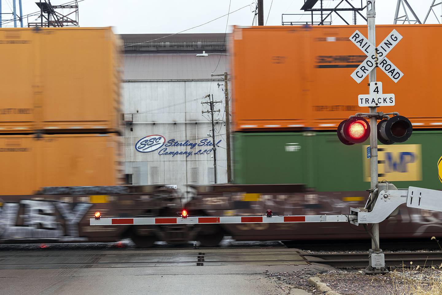 A train passes through the Sterling Avenue K crossing Monday, Jan. 16, 2023. The city council will be voting whether to make this and three other crossings a quiet zone.